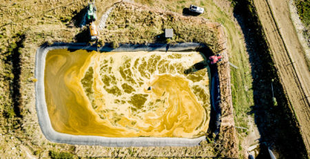 Large slurry pond from above. Farm Slurry